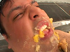 Messy stud gets covered with food and gets cock sucked