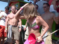 Randy babe in the party outdoor dancing in miniskirt and showing ass