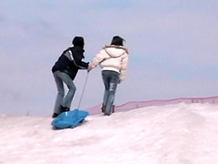 Hot girls in tight jeans outside playing in the snow