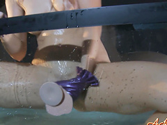 Blonde toys with pussy in aquarium tank