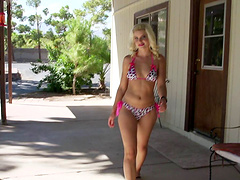 Sassy blonde in a bikini being smashed doggy style outdoors in a reality shoot