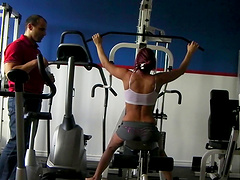 Red hot pornstar Roxy Lane wearing tight shorts while working out