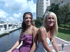 Two depraved chicks flash their butts and tits outdoors