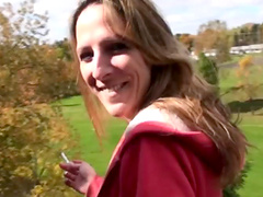 Brown-haired milf sucks a cock greedily outdoors in POV clip