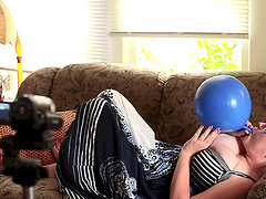 Chubby Sabina Leigh in glasses shows big tits and plays with ballons