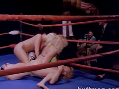 Sexy female wrestlers end up topless in the middle of the ring