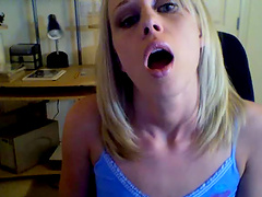 Blonde babe in the office rubbing her cunt on webcam