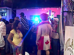 Randy sluts at a party in the streets showing off ass and tits