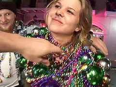 Randy slut flashing her nice tits at the mardi gras party