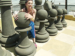 Interracial sex on the life size outdoor chess set