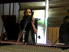 A hot MILF gets pounded in a recording studio by a musician