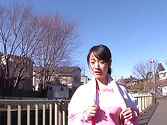 Busty Japanese chick Asami Nagase drops on her knees to give head