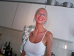 Blonde mature Melizza More with glasses takes a fat cock in her mouth