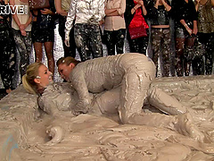 Dirty catfight in a mud pit with horny glamour girls. HD video