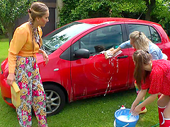 Dirty sluts love to be wet while playing with water in the back-yard