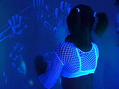 Black light body paint play with a babe in white lingerie