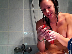 Hot steamy action as the babe shaves and fingers in the shower