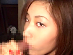 Getting a blowjob from a hot clothed Japanese babe