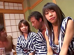 Japanese amateur gets undressed and fucked by two horny men