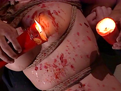 Hardcore torture session with candle wax for a busty Japanese chick