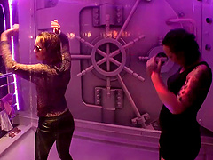 Erotic lesbian babes showcases their dirty dance moves at a raining podium