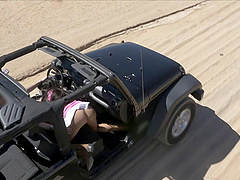 Parking his jeep in the sand and fucking the big tits babe