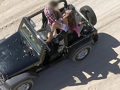 Parking his jeep in the sand and fucking the big tits babe