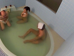 Video of sexy Japanese babe getting fucked by thee dudes in the pool