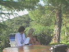 Outdoor fucking during a picnic with handsome Amber Lynn - Retro video