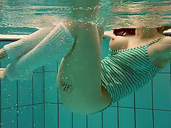 Natural tits model Dashka with glasses playing in the pool