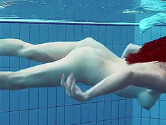 Piyavka Chehova jumps in the pool and gets naked underwater