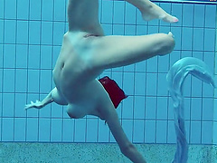 Piyavka Chehova jumps in the pool and gets naked underwater