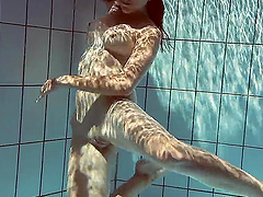 Amateur Russian babe Sima Lastova loves to be filmed nude in the pool