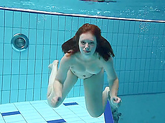 Nude swiming in the pool with amateur Russian redhead Lenka