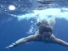 Wild girls swimming naked in the ocean while a friend films them