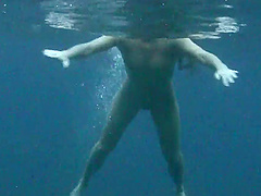 Wild girls swimming naked in the ocean while a friend films them