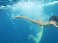 Naked swimming in the ocean with couple of attractive chicks