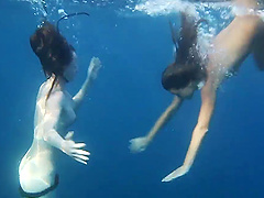 Naked swimming in the ocean with couple of attractive chicks