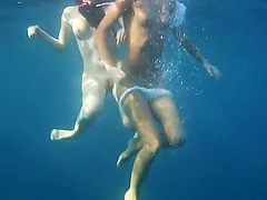 Naked swimming in the ocean with couple of attractive chicks