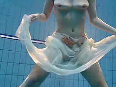 Solo babe Andrea loves to go skinny dipping in the family pool