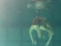 Small tits teen shading attire seductively under water