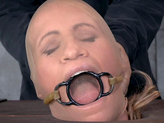 Stunning blonde pornstar Matt Williams tied up and tortured