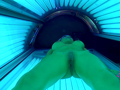 Blonde Asian chick with big tits ride a cock in a tanning salon