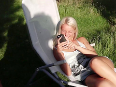 Long hair lesbian in shorts loving her pussy licked outdoor