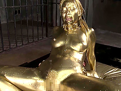 Japanese woman covered in golden paint fucked hard by her partner