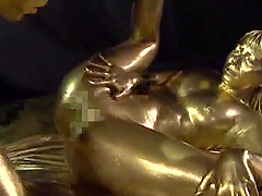 Ai Uehara is a babe covered in golden paint craving a cock