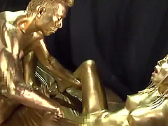 Ai Uehara is a babe covered in golden paint craving a cock