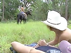 Busty cowgirl knows how to milk a fellow's massive boner