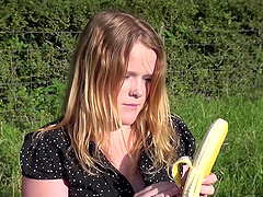 Morgan Lovesex takes off her dress and grabs a wiener on the grass