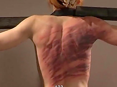 Extreme torture and spanking between a dominant lady and her slave